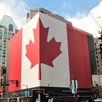 Office building wrapped with huge nylon flag 