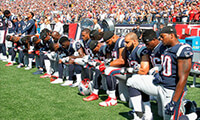 Members of the New England Patriots kneel during the National Anthem before a game against the Houston Texans at Gillette Stadium on September 24, 2017 in Foxboro, Massachusetts. (Photo by Jim Rogash/Getty Images) (Photo: Jim Rogash/Getty Images, 2017 Getty Images)