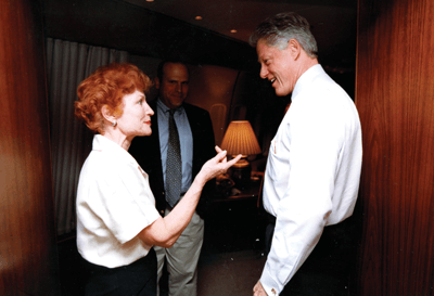 Ann McCoy shares a light moment with President Bill Clinton in the West Wing