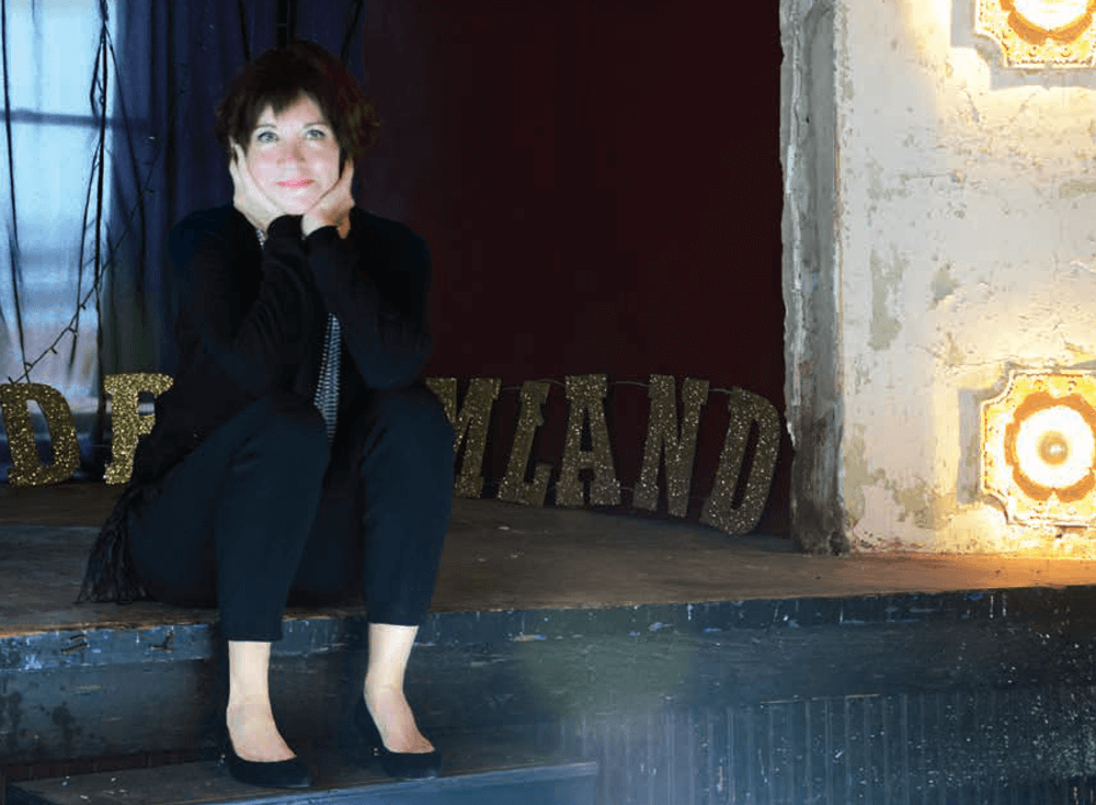 Kerry McCoy on the steps of the Dreamland Ballroom