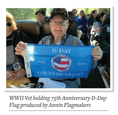 WWII Vet holding 75th Anniversary D-Day Flag produced by Annin Flagmakers