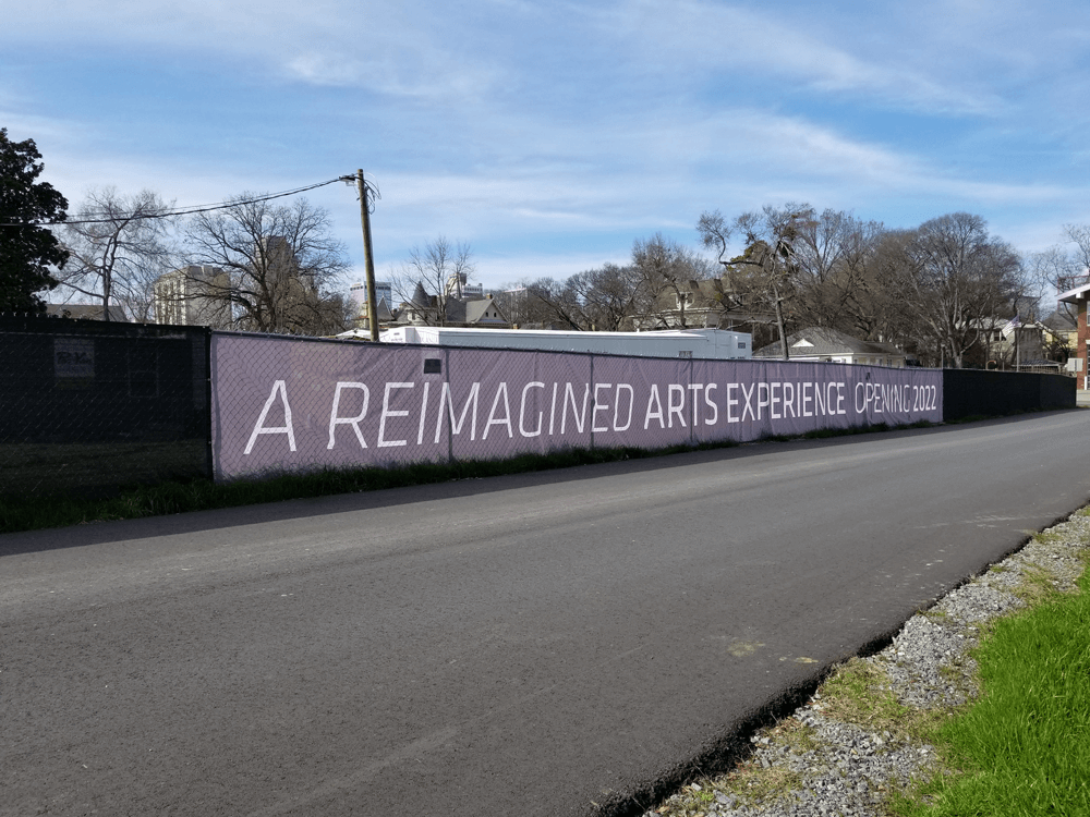 An example of a mesh banner hiding construction