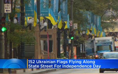 Ukraine flags line State Street in Chicago, IL. (CBS News)