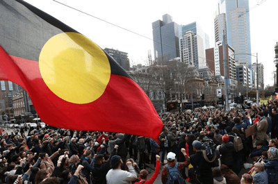 The Australian government has bought the Aboriginal flag's copyright in a bid to free the symbol of identity from bitter fights over who can use it. / Getty Images