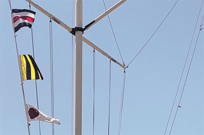 Signal flags flying on the nautical pole in Belvedere / Photo: Hannah Weikel