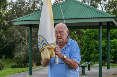 PHOTO: David Floyd beats the sunrise each morning to raise the flag at the local park. (ABC Radio Brisbane: Jessica Hinchliffe)