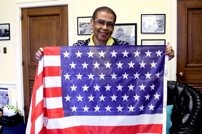 Del. Eleanor Holmes Norton, D-D.C., presents a U.S. flag with 51 stars, commemorating the possibility of adding Washington, D.C., as the 51st state, in her Capitol Hill office on Feb. 18, 2020.Thomas McKinless / CQ-Roll Call Inc. via Getty Images file