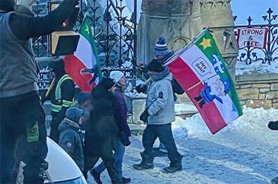 A Patriote flag with a gnome on it, seen in Ottawa, is a symbol of the Quebec-based anti-COVID restriction group Les Farfadaas (CBC)