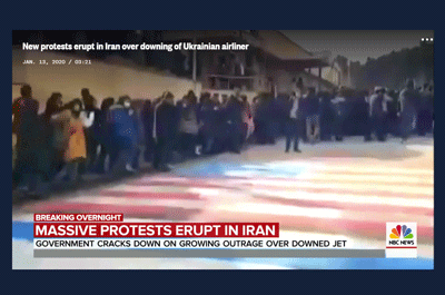 Iranian protestors avoid walking on US and Israel flags / NBC News