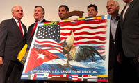 The mayor of Miami, Carlos A. Giménez, presents the new flag of Little Havana. @CityofMiami @CityofMiami