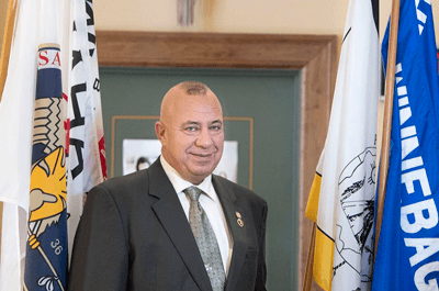 State Sen. Tom Brewer introduced legislation to require the display of the four Nebraska tribal flags representing the Santee Sioux (from left), Omaha, Ponca and Winnebago tribes in the legislative chamber (GWYNETH ROBERTS, Journal Star file photo)