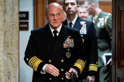 FILE PHOTO: Navy Adm. Michael Gilday, chief of naval operations, arrives to testify to the Senate Armed Services Committee about military housing on Capitol Hill in Washington, U.S., December 3, 2019. REUTERS/Joshua Roberts/File Photo