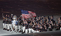 Flag-bearer Todd Lodwick of the U.S. leads his country's contingent during the athletes' parade at the opening ceremony of the Sochi 2014 Winter Olympic Games February 7, 2014.  Credit: Grigory Dukor/Reuters