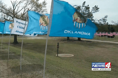 Oklahoma and US Flags flying on the Oklahoma State Capitol grounds. Credit: KFOR 4