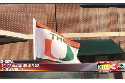 Shreveport, LA police waving Miami U flags