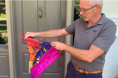 Ten scorched rainbow flags were discovered outside a Corsicana home (NBCDFW 5)