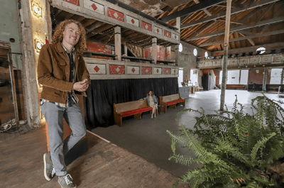 Matthew McCoy (left) and his mother, Kerry McCoy, are seen Friday afternoon inside the Dreamland Ballroom on West Ninth Street in Little Rock. The 100-year-old facility has received a National Park Service grant for accessibility upgrades and other modifications.â€¨(Arkansas Democrat-Gazette/John Sykes Jr.)