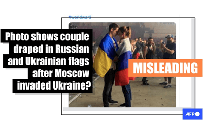 Photo of couple draped in Russian and Ukrainian flags has circulated online since 2019 (AFP)