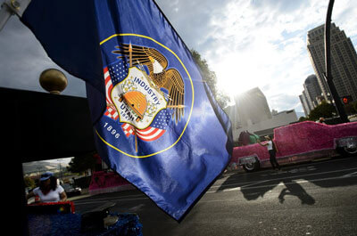 
(Steve Griffin | Tribune file photo) In this July 24, 2017, photo, the Utah state flag waves in the morning sun at the start of the Days of '47 Parade in Salt Lake City. A Utah state lawmaker is leading an effort to redesign the flag.