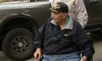 Retired naval aviator Frank Coleman was honored to have assistance from the scouts retiring his flags.  (FOX 5 Atlanta)