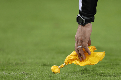 A yellow flag used in the NFL (Sportscasting)